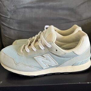 Kids New Balance Light Blue Sneakers in used condition